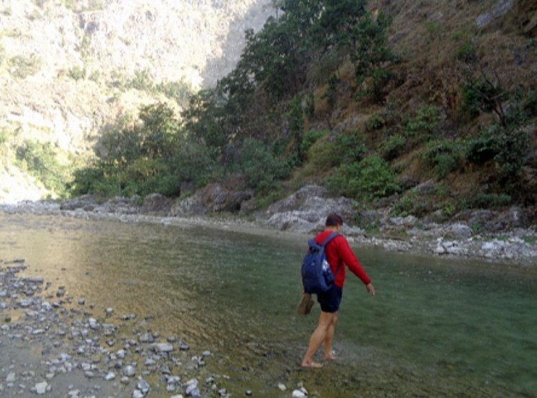 Dr. Vishnu Singh, Secretary of SEL, crossing the river ladhiya